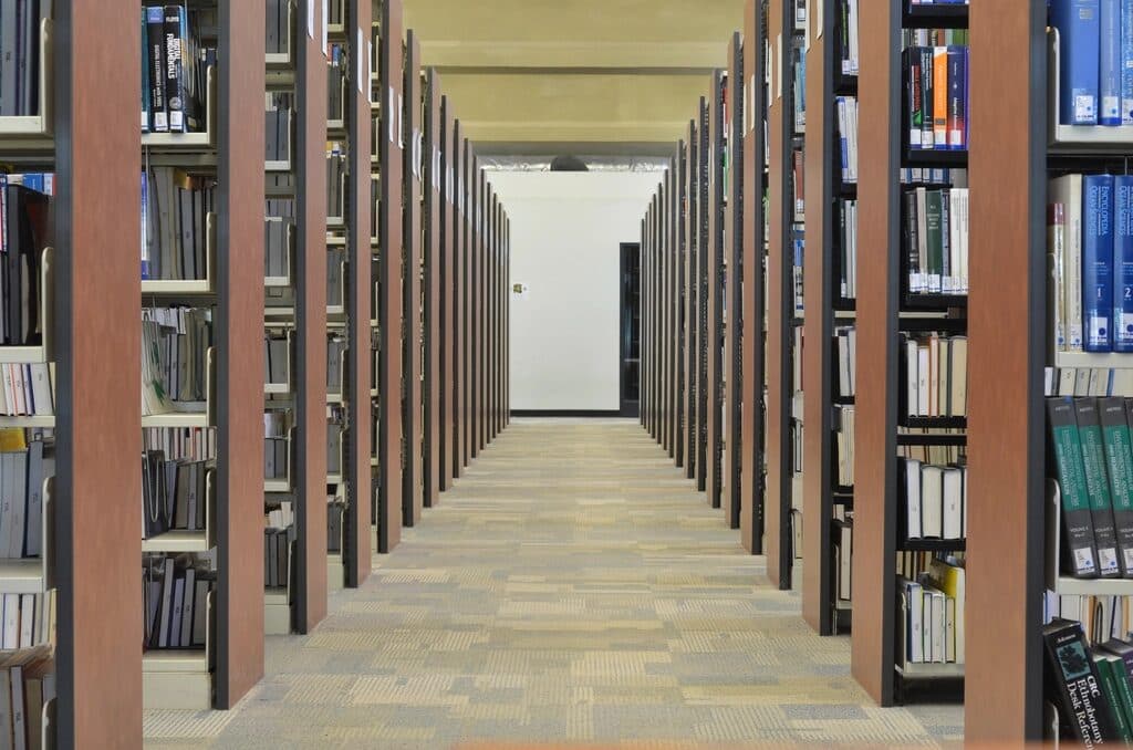 Rows of archive shelving holding bound records